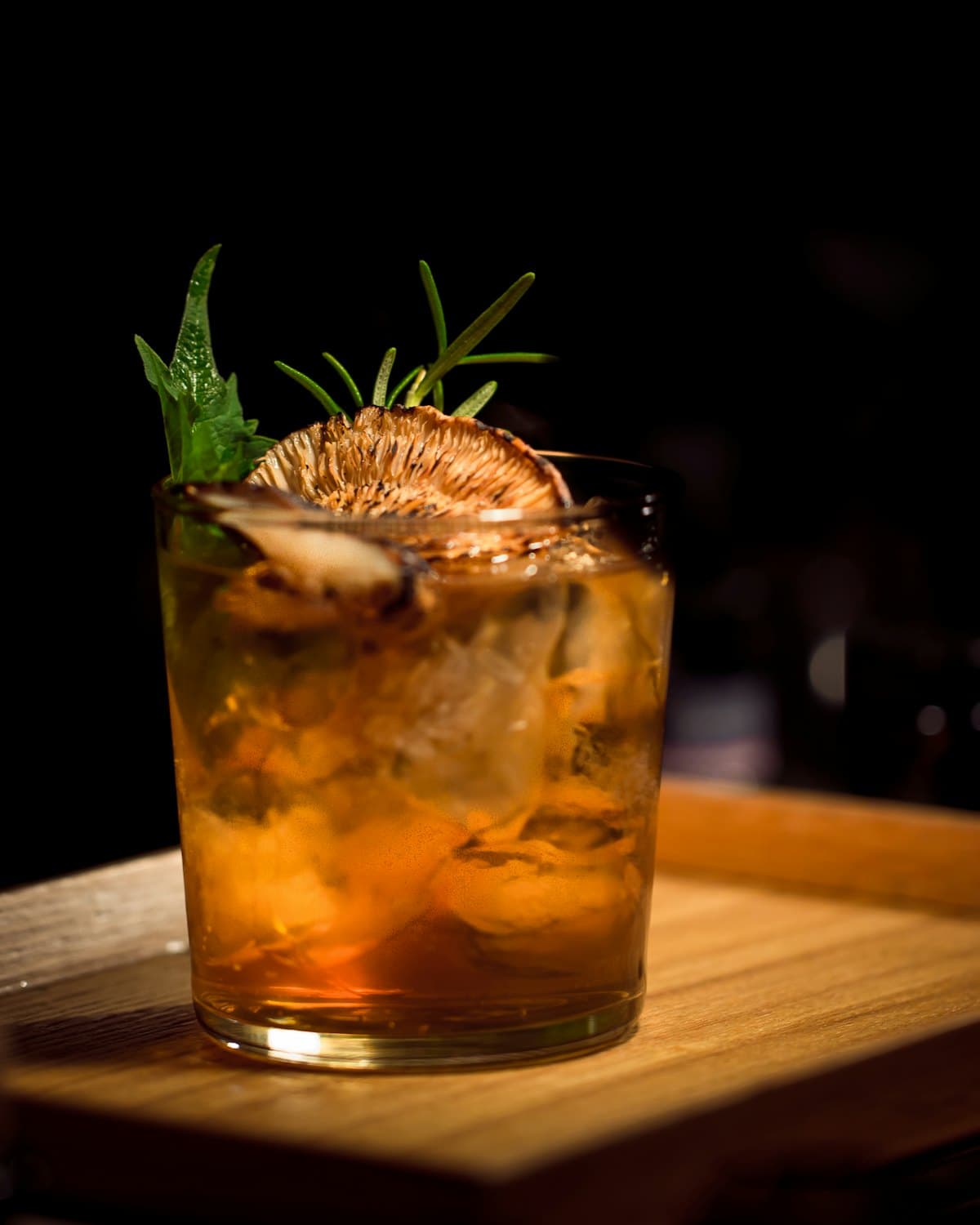 A signature cocktail resting on the bar